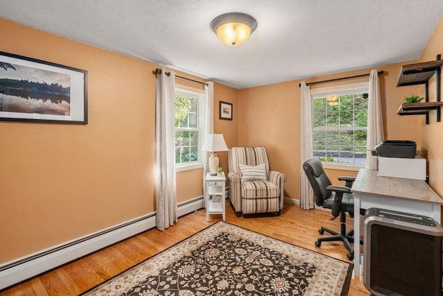 72 S Shore Dr, Sturbridge, MA 01566 - office space featuring wood finished floors, a baseboard heating unit, and baseboards