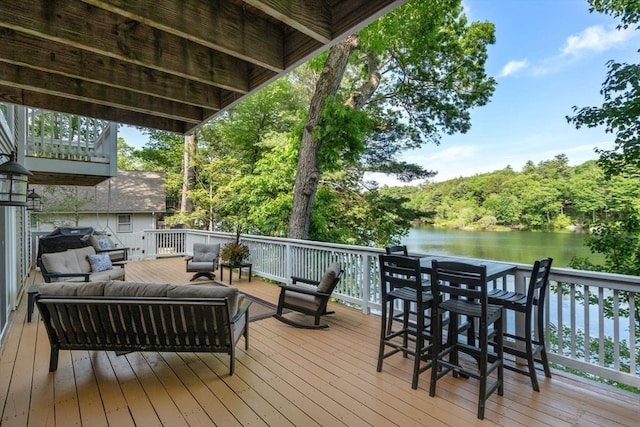 72 S Shore Dr, Sturbridge, MA 01566 - wooden deck featuring outdoor lounge area and a water view