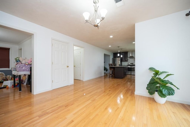 7 Willow Brook Ln, Blackstone, MA 01504 - living room featuring light wood-type flooring, a chandelier, baseboards, and recessed lighting