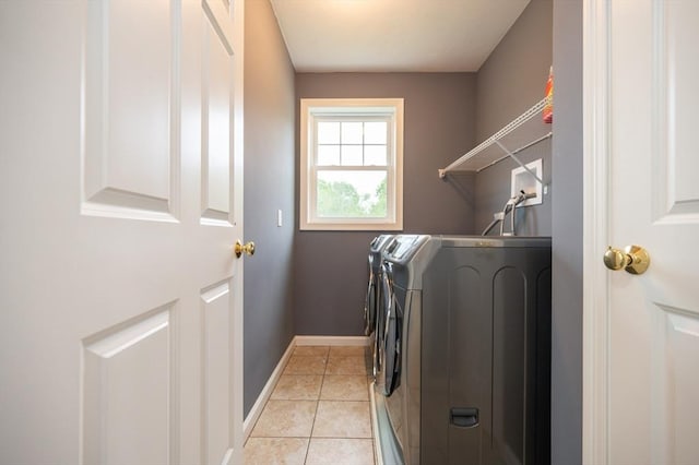 7 Willow Brook Ln, Blackstone, MA 01504 - washroom with washing machine and clothes dryer, light tile patterned flooring, and baseboards