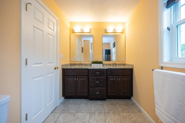 7 Willow Brook Ln, Blackstone, MA 01504 - full bath featuring double vanity, baseboards, tile patterned flooring, and toilet