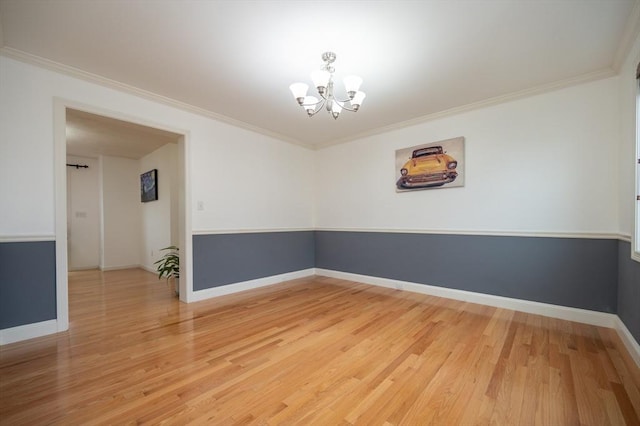 7 Willow Brook Ln, Blackstone, MA 01504 - spare room with a chandelier, light wood finished floors, baseboards, and ornamental molding