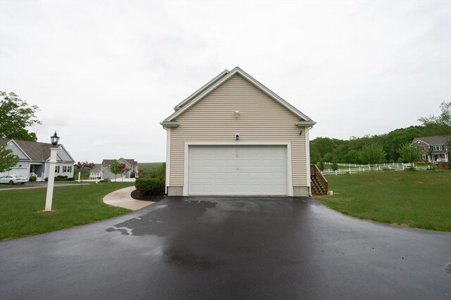 7 Willow Brook Ln, Blackstone, MA 01504 - garage featuring asphalt driveway