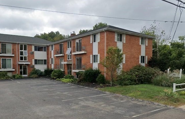 3 Endicott Unit 1, Norwood, MA 02062 - view of property featuring uncovered parking