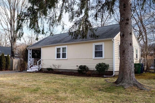 view of front of home featuring roof with shingles