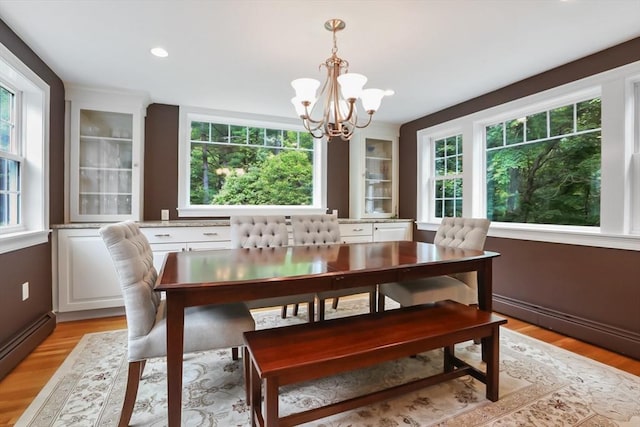5 Fox Run Rd, Topsfield, MA 01983 - dining space with healthy amount of natural light, a chandelier, and light wood-style flooring