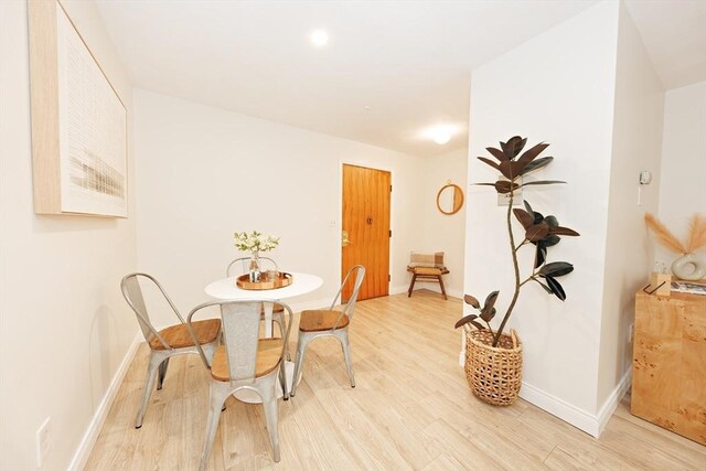 25 Linden Ave Unit 4, Somerville, MA 02143 - dining area featuring light wood-style floors and baseboards