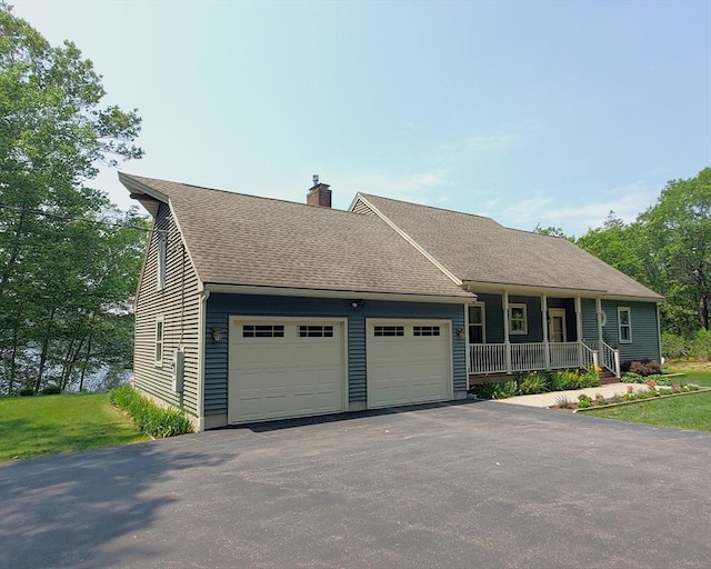 92 Wallace Ave, Auburn, MA 01501 - view of front facade featuring a chimney, a porch, a garage, driveway, and roof with shingles