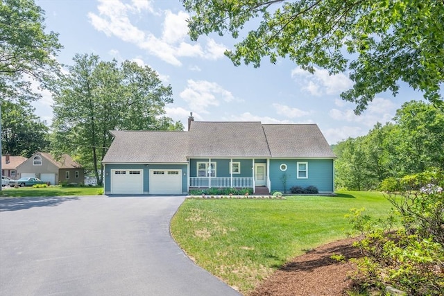 92 Wallace Ave, Auburn, MA 01501 - view of front of home with a porch, asphalt driveway, a front yard, a garage, and a chimney