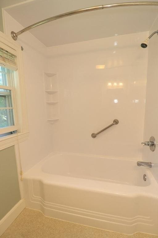53 Perkins St, Stoneham, MA 02180 - bathroom featuring shower / tub combination and baseboards