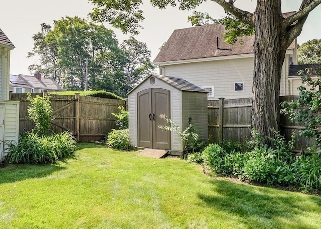 53 Perkins St, Stoneham, MA 02180 - fenced backyard featuring a storage shed