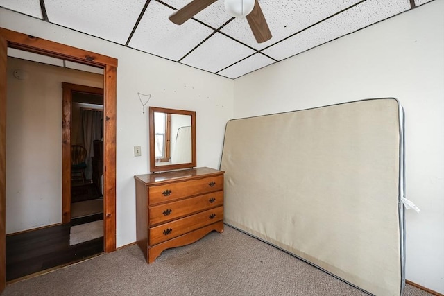 bedroom with ceiling fan and carpet flooring