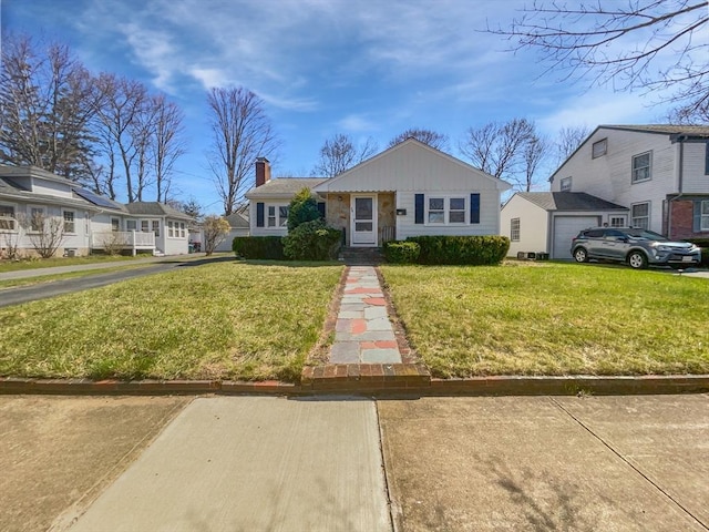 58 Morse Ave, Brockton, MA 02301 - bungalow-style home with a residential view, aphalt driveway, and a front yard