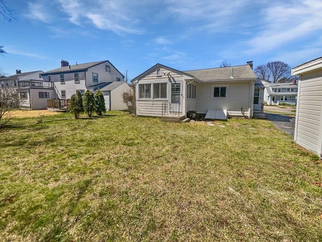 58 Morse Ave, Brockton, MA 02301 - back of property featuring a yard and a residential view