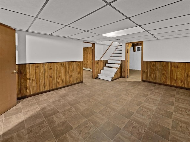 58 Morse Ave, Brockton, MA 02301 - finished below grade area with stairway, a wainscoted wall, baseboards, and wood walls