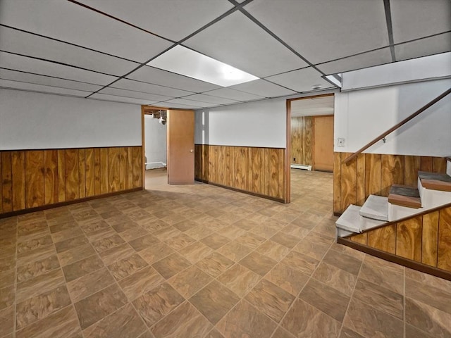 58 Morse Ave, Brockton, MA 02301 - finished below grade area with a wainscoted wall, baseboards, wooden walls, a drop ceiling, and stairs