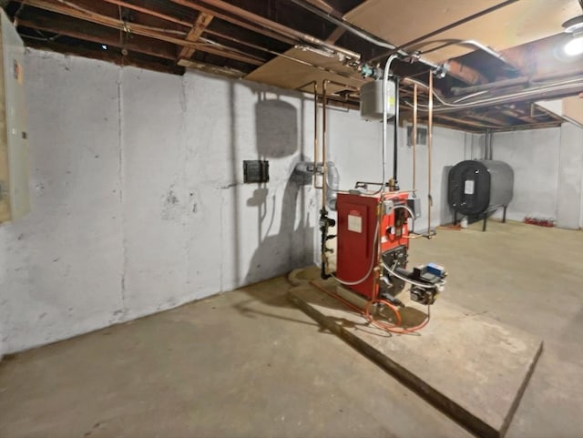 58 Morse Ave, Brockton, MA 02301 - unfinished basement featuring a heating unit and heating fuel