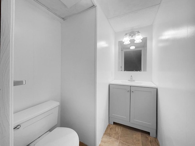 58 Morse Ave, Brockton, MA 02301 - bathroom featuring vanity, stone finish floor, and toilet