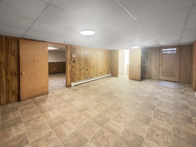 58 Morse Ave, Brockton, MA 02301 - finished below grade area with a baseboard radiator, a drop ceiling, and wooden walls