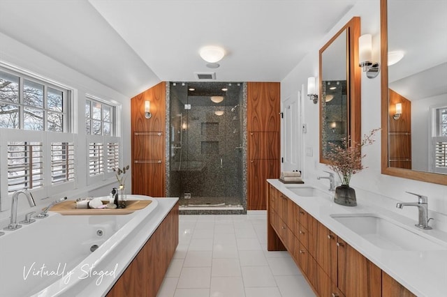 bathroom with double vanity, a sink, visible vents, and a shower stall