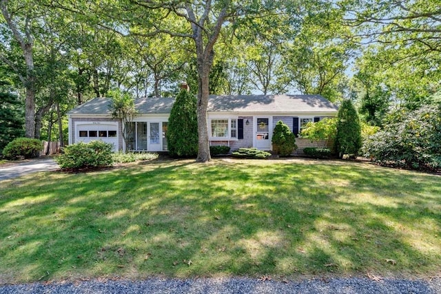 33 Swift Brook Rd, Yarmouth, MA 02664 - ranch-style home featuring a garage and driveway