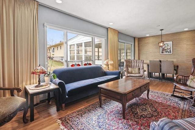 living area featuring recessed lighting and wood finished floors