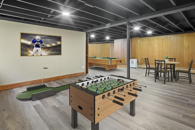 recreation room with wooden walls, baseboards, wood finished floors, and pool table