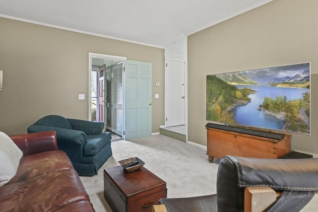 carpeted living room featuring baseboards and ornamental molding