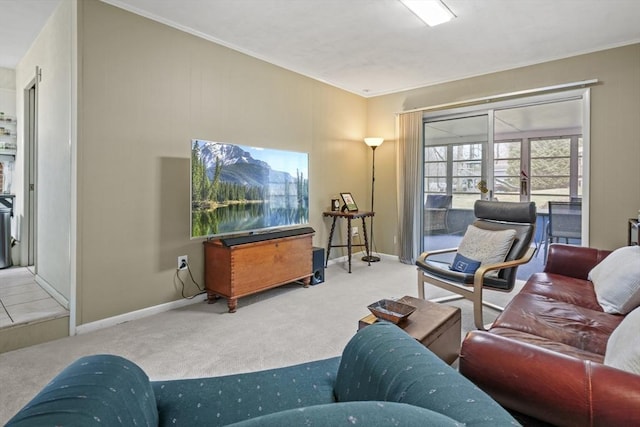 living room with carpet flooring, baseboards, and ornamental molding