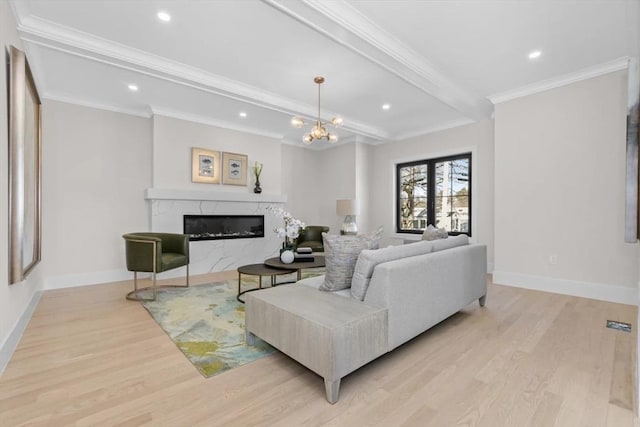 40 Maplewood Unit 40, Boston, MA 02132 - living area featuring a high end fireplace, baseboards, and light wood-style floors