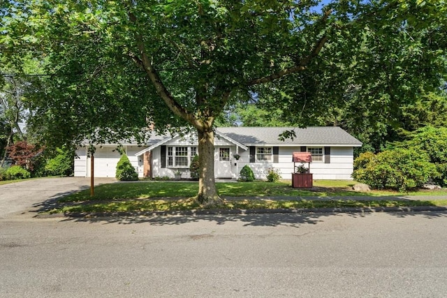 5 Villa Ln, Peabody, MA 01960 - view of front of house with driveway, a garage, and a front yard