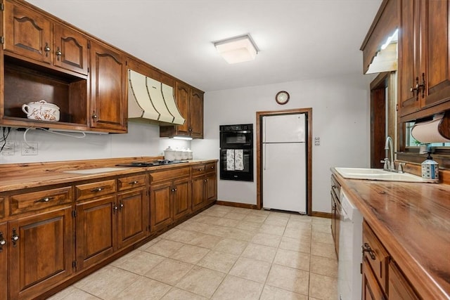 5 Villa Ln, Peabody, MA 01960 - kitchen featuring butcher block counters, exhaust hood, black appliances, open shelves, and brown cabinetry