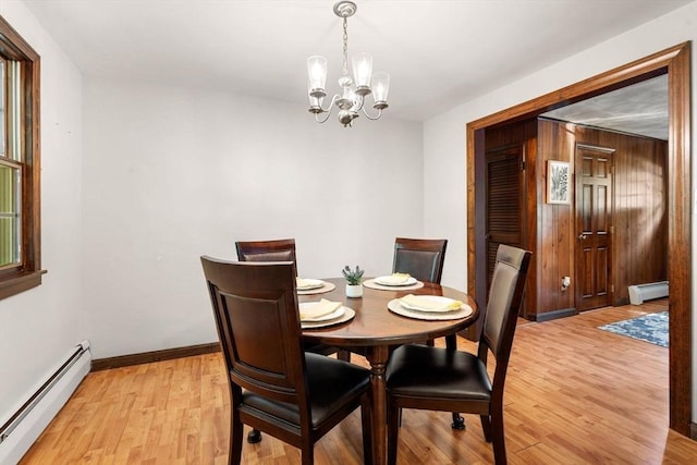 5 Villa Ln, Peabody, MA 01960 - dining room featuring baseboard heating, a chandelier, and light wood-style floors