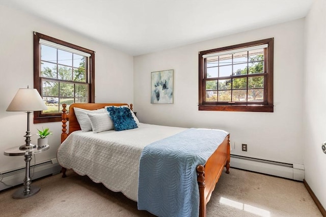 5 Villa Ln, Peabody, MA 01960 - carpeted bedroom with a baseboard radiator