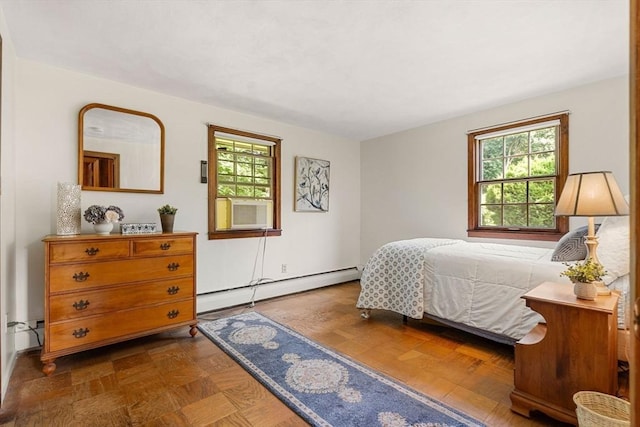 5 Villa Ln, Peabody, MA 01960 - bedroom with a baseboard radiator, multiple windows, and cooling unit