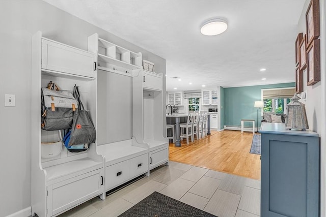 16 Vanderbelt Rd, Acton, MA 01720 - mudroom with recessed lighting, a baseboard radiator, baseboards, and light wood-type flooring