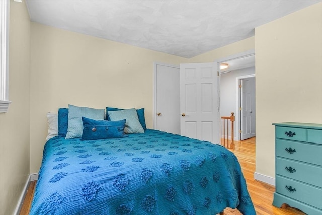 16 Vanderbelt Rd, Acton, MA 01720 - bedroom featuring wood finished floors and baseboards