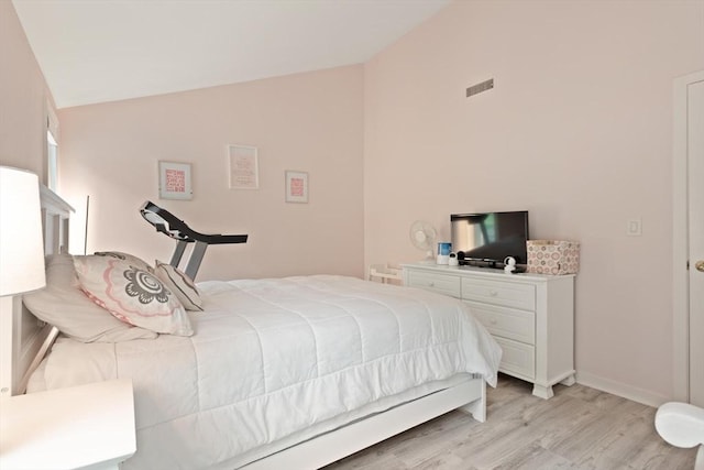 116 Mill Pond Unit 116, North Andover, MA 01845 - bedroom with vaulted ceiling and light wood finished floors