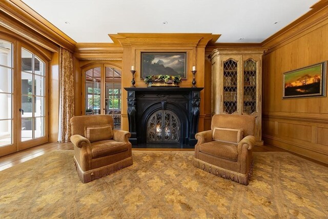 180 Ash St, Weston, MA 02493 - sitting room featuring ornamental molding and a lit fireplace