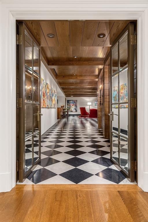 180 Ash St, Weston, MA 02493 - hall with wood ceiling and tile patterned floors