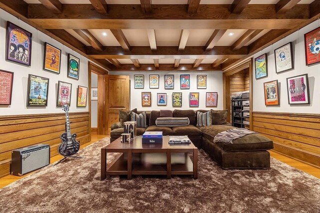 180 Ash St, Weston, MA 02493 - home theater room with wood walls, beamed ceiling, a wainscoted wall, and wood finished floors