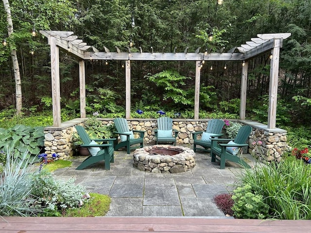 view of patio / terrace featuring a fire pit