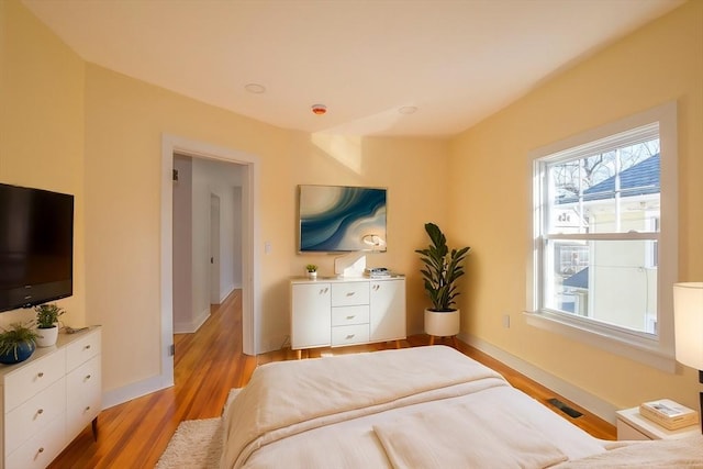 bedroom featuring light hardwood / wood-style flooring