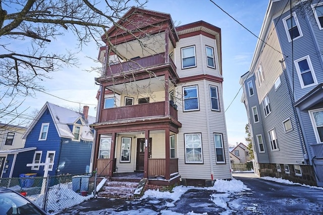 view of front of home with a balcony