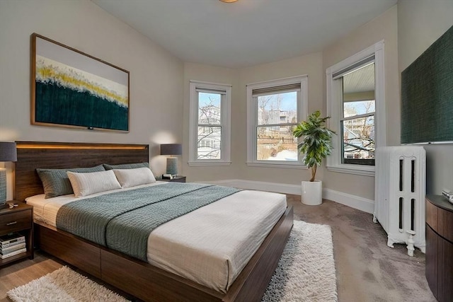 bedroom with radiator heating unit