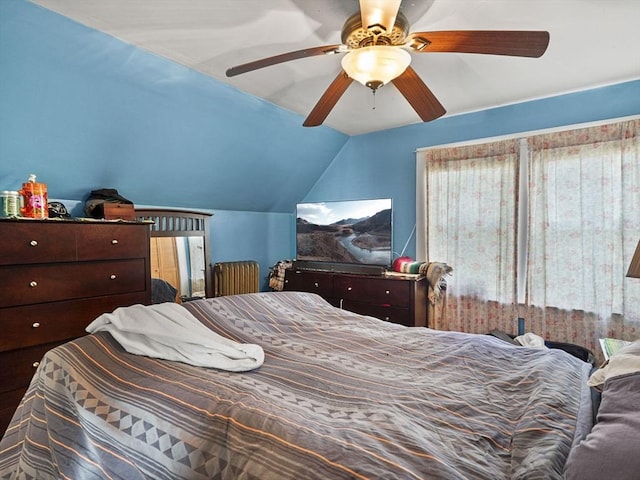 bedroom with ceiling fan and lofted ceiling