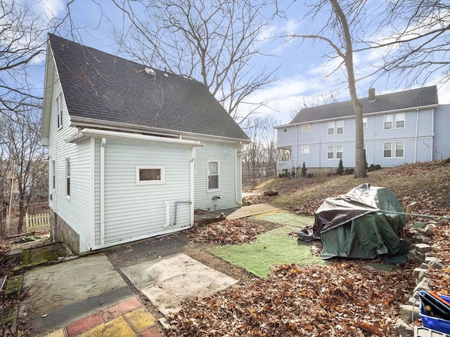 back of property featuring a patio area