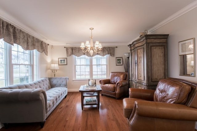 living room featuring a notable chandelier, dark wood-type flooring, ornamental molding, and plenty of natural light