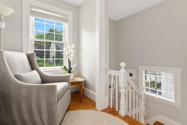518 Washington St, Winchester, MA 01890 - sitting room featuring an upstairs landing, wood finished floors, and baseboards