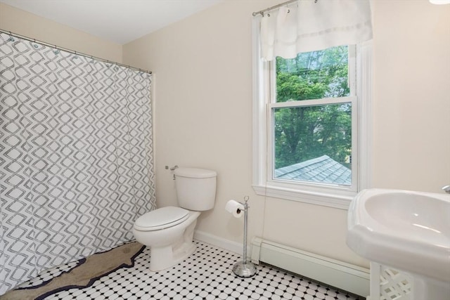 518 Washington St, Winchester, MA 01890 - bathroom featuring a baseboard radiator, toilet, plenty of natural light, and a shower with curtain